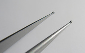 Mikro - Pinzettenspitze (mit Ring Ø 1.0mm + 0.5mm Bohrung)